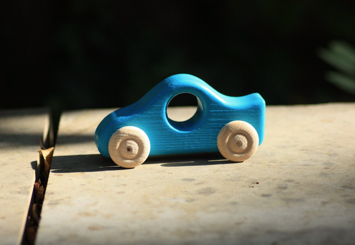 Holzauto Türkis